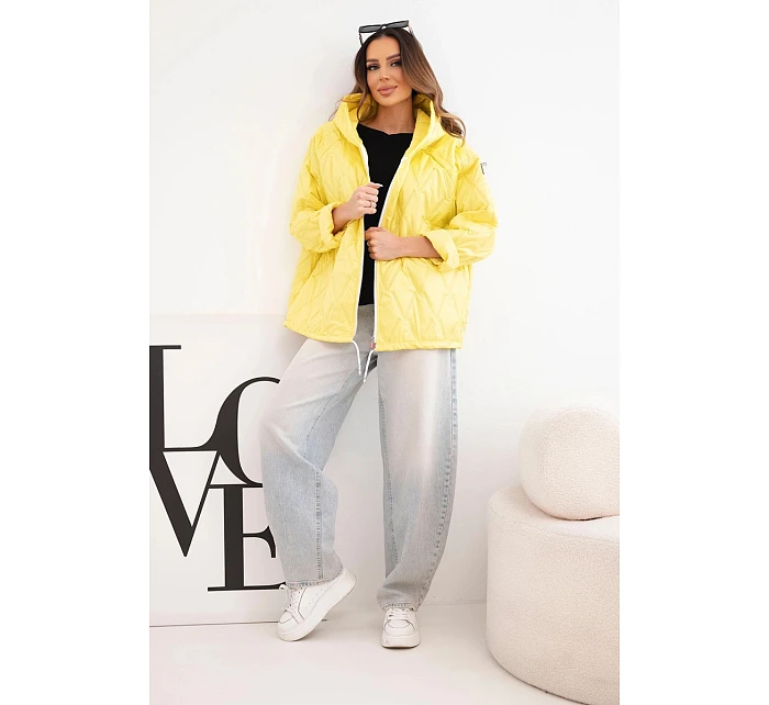Dámská jarní prošívaná bunda s kapucí a zipem tmavě žlutá