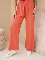 Kalhoty mušelínové s širokým nohavicí malinové