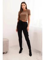 Dámské bavlněné kalhoty s v pase a nohavicí černé model 21768708 - K-Fashion Dámské bavlněné kalhoty s v pase a nohavicí černé model 21768708 - K-Fashion