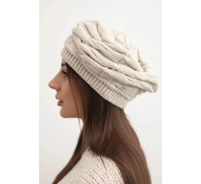 Dámská zimní čepice z vlny s ozdobným vzorem a kamínky model 21878087 béžová - K-Fashion