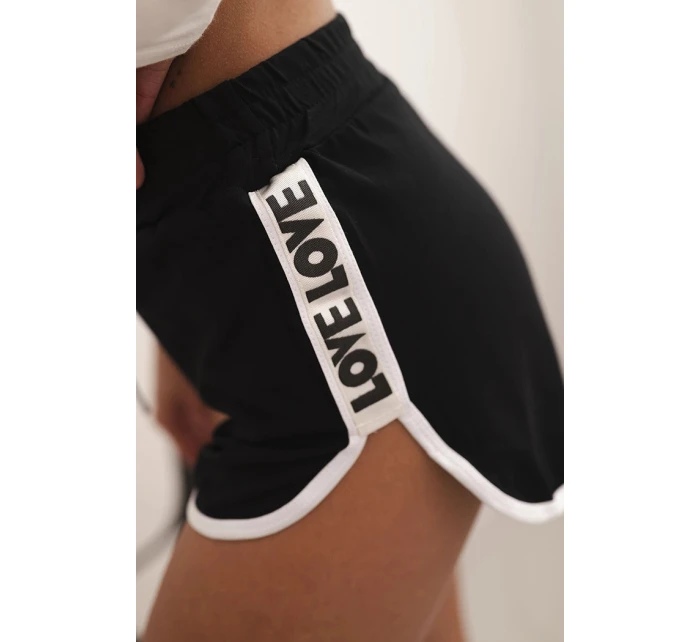 Dámské bavlněné šortky s elastickým pasem a sportovním lemem černé Dámské bavlněné šortky s elastickým pasem a sportovním lemem černé