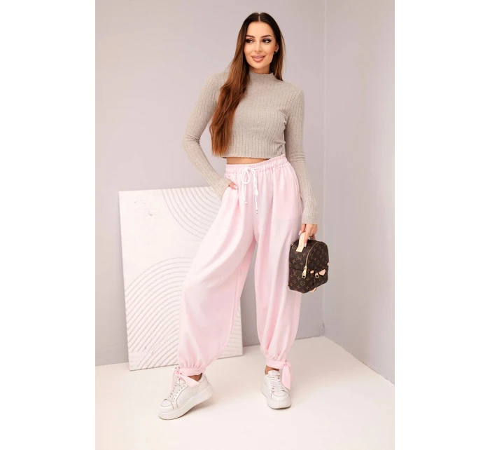 Dámské kalhoty s širokými nohavicemi a zavazováním dole cukrově růžový