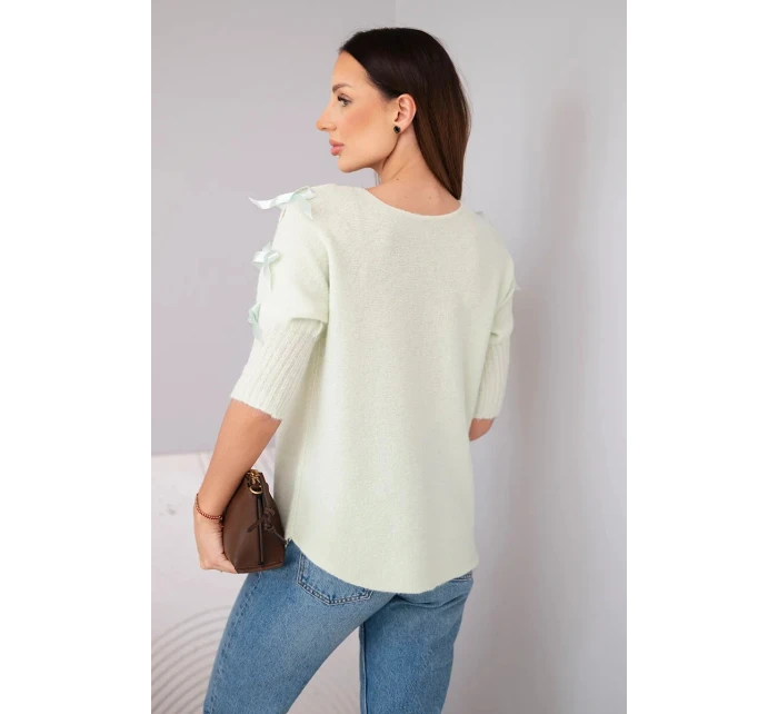 Dámský svetr s krátkým rukávem a ozdobnými mašličkami mátový
