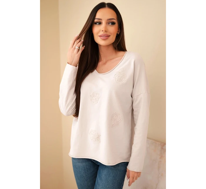 Dámská bavlněná blůza s květy a V výstřihem model 21890110 - K-Fashion