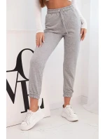 Dámské bavlněné kalhoty s gumou v pase šedé Dámské bavlněné kalhoty s gumou v pase šedé