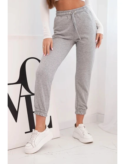 Dámské bavlněné kalhoty s gumou v pase šedé Dámské bavlněné kalhoty s gumou v pase šedé