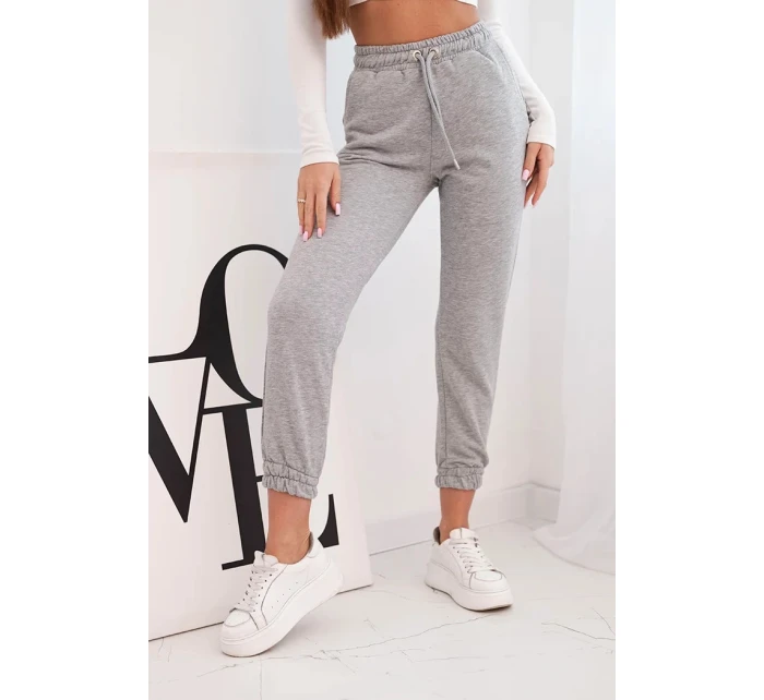 Dámské bavlněné kalhoty s gumou v pase šedé Dámské bavlněné kalhoty s gumou v pase šedé