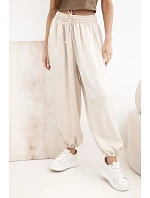 Široké dámské kalhoty s gumou v pase a typu béžové model 22064415 - K-Fashion Široké dámské kalhoty s gumou v pase a typu béžové model 22064415 - K-Fashion