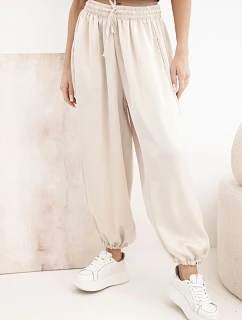Široké dámské kalhoty s gumou v pase a šňůrováním typu aladinky béžové