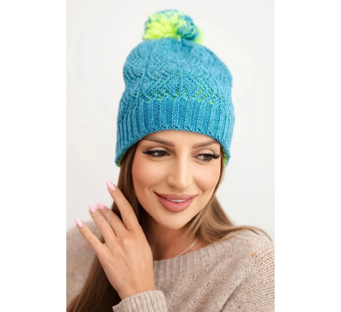 Dámská zimní čepice s vlnou v ozdobném pletení s bambulí K467 džínová Dámská zimní čepice s vlnou v ozdobném pletení s bambulí K467 džínová