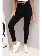 Dámské tepláky s elastickým pasem a šňůrkou černé