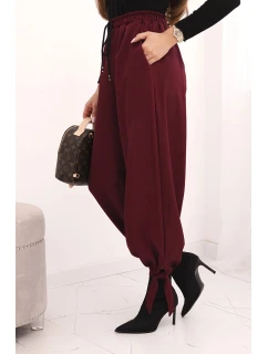 Dámské kalhoty s širokým nohavicí a zavazováním dole bordové