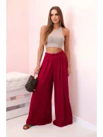 Široké dámské kalhoty s elastickým pasem tmavě vínová