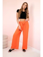 Kalhoty s širokým pasem tmavě oranžová