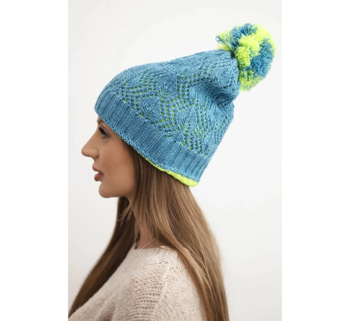 Dámská zimní čepice s vlnou v ozdobném pletení s bambulí K467 džínová Dámská zimní čepice s vlnou v ozdobném pletení s bambulí K467 džínová