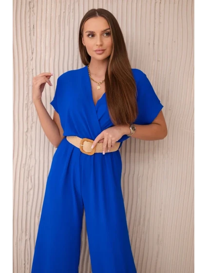 Kombinéza s ozdobným páskem v pase chrpově modrá Kombinéza s ozdobným páskem v pase chrpově modrá