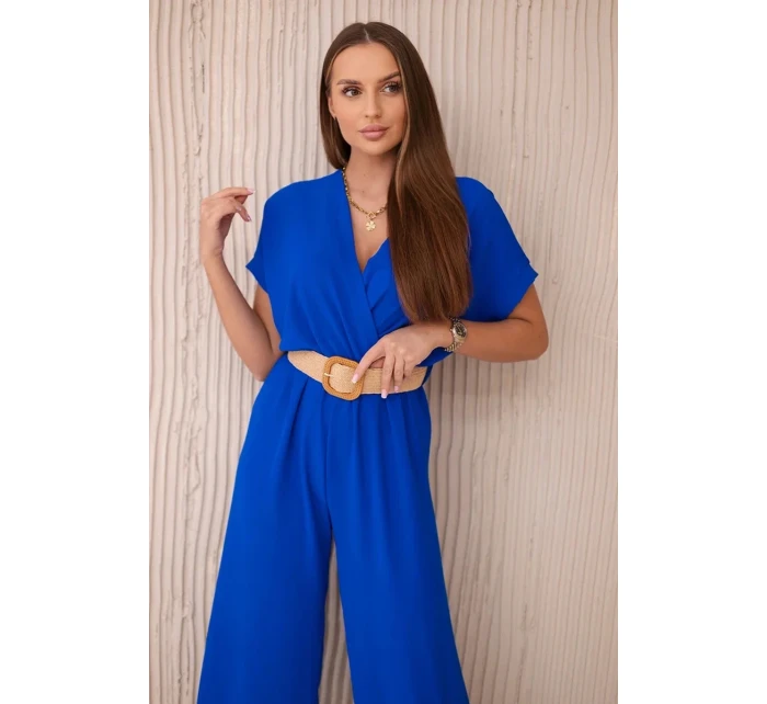 Kombinéza s ozdobným páskem v pase chrpově modrá Kombinéza s ozdobným páskem v pase chrpově modrá