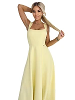 dlouhé šaty s rozparkem a výstřihem typu  žluté s třpytkami model 22092786 - numoco
