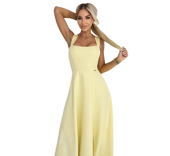 dlouhé šaty s rozparkem a výstřihem typu  žluté s třpytkami model 22092786 - numoco