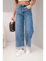 Dámské kalhoty s širokými nohavicemi a model 21961281 spodním lemem džínové modré - K-Fashion