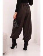 Dámské kalhoty s širokými nohavicemi a zavazováním na model 21780859 hnědé - K-Fashion Dámské kalhoty s širokými nohavicemi a zavazováním na model 21780859 hnědé - K-Fashion