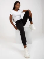 B 005 tepláky.11X černá