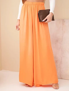 Dámské široké viskózové kalhoty s gumou v pase oranžové