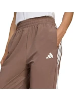 Dámské kalhoty Train Essentials 3Stripes Woven brown model 21738012 dámské - ADIDAS Dámské kalhoty Train Essentials 3Stripes Woven brown model 21738012 dámské - ADIDAS
