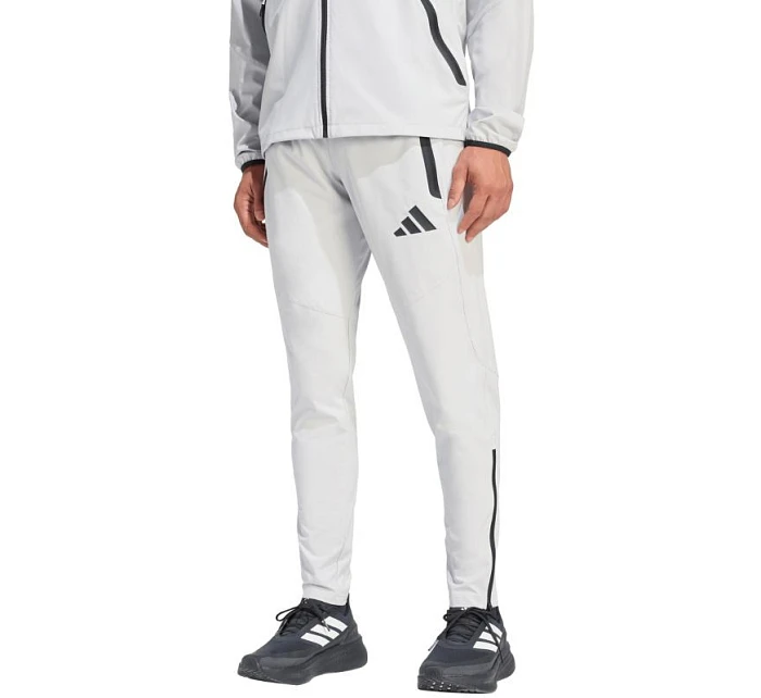 Pánské kalhoty adidas Tiro 26 Travel Woven světle šedé KE8363