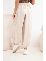 Široké dámské kalhoty s gumou v pase a typu béžové model 22064415 - K-Fashion Široké dámské kalhoty s gumou v pase a typu béžové model 22064415 - K-Fashion