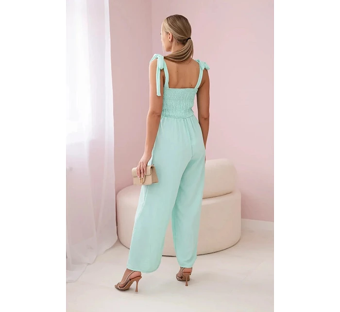 Overal na ramínka 2706 tyrkysový - Kesi Overal na ramínka 2706 tyrkysový - Kesi