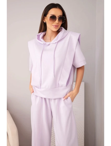 Dámský komplet model 22022727 mikina s kapucí a volné kalhoty se zavazováním světle fialová - K-Fashion Dámský komplet model 22022727 mikina s kapucí a volné kalhoty se zavazováním světle fialová - K-Fashion