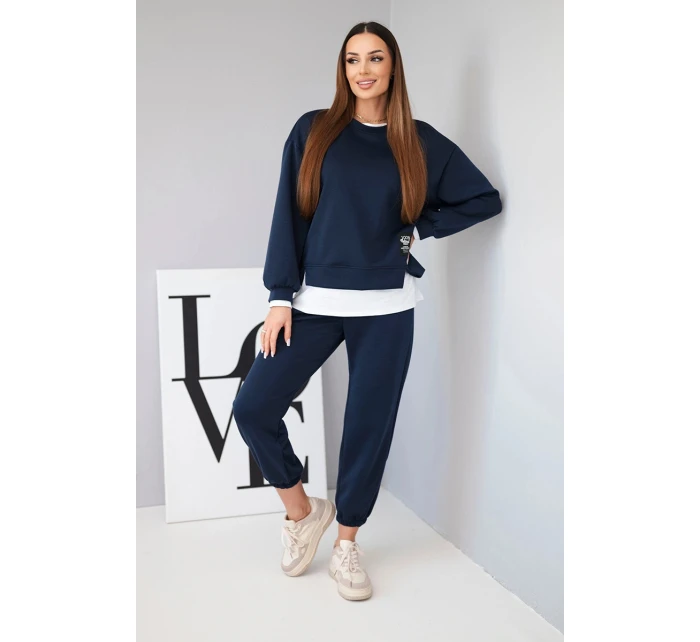 Dámský komplet s máslovou mikinou a volnými tepláky modrý Dámský komplet s máslovou mikinou a volnými tepláky modrý