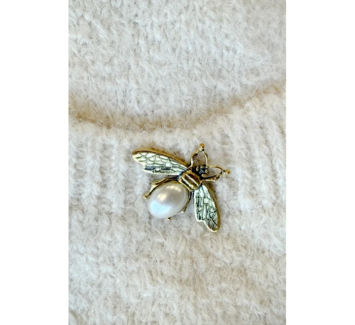 Módní oversize svetr s ozdobnou broží a kapsami béžový model 21322456 - numoco basic