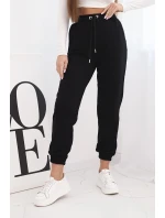Dámské bavlněné kalhoty s gumou v pase černé Dámské bavlněné kalhoty s gumou v pase černé
