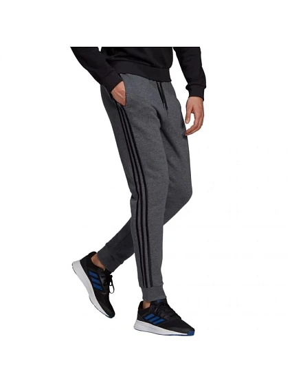 Pánské tepláky Essentials Tapered Cuff 3 Stripes M model 17536439 - ADIDAS Pánské tepláky Essentials Tapered Cuff 3 Stripes M model 17536439 - ADIDAS