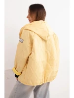 Dámská model 21791591 prošívaná bunda s kapucí a zipem žlutá - K-Fashion Dámská model 21791591 prošívaná bunda s kapucí a zipem žlutá - K-Fashion