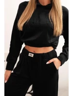 Dámský velurový komplet tepláků se širokými nohavicemi a mikinou s kapucí černý Dámský velurový komplet tepláků se širokými nohavicemi a mikinou s kapucí černý