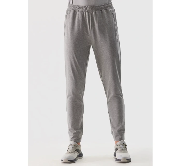Pánské sportovní rychleschnoucí kalhoty 4F - chladné světle šedé Pánské sportovní rychleschnoucí kalhoty 4F - chladné světle šedé