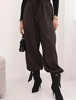 Dámské kalhoty s širokými nohavicemi a zavazováním na spodku hnědé