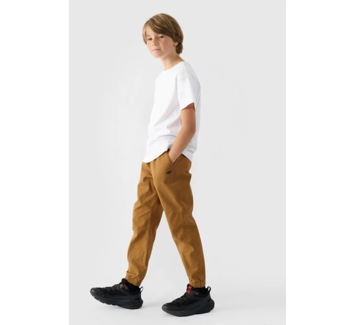Chlapecké Kalhoty Jogger Casual Hladké Khaki model 21668686 - 4F Chlapecké Kalhoty Jogger Casual Hladké Khaki model 21668686 - 4F