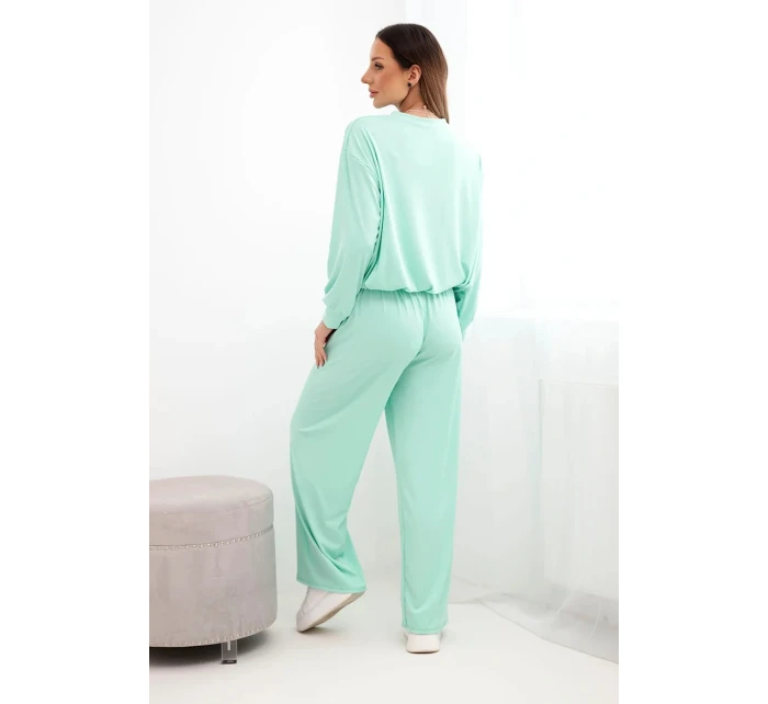 Dámský komplet z model 21951985 mikina s přívěskem a široké kalhoty mentolová - K-Fashion Dámský komplet z model 21951985 mikina s přívěskem a široké kalhoty mentolová - K-Fashion