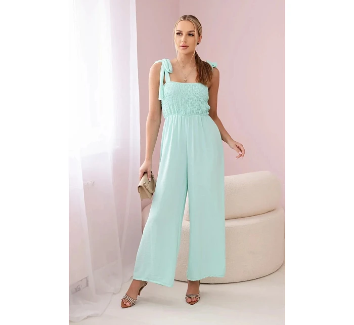 Overal na ramínka 2706 tyrkysový - Kesi Overal na ramínka 2706 tyrkysový - Kesi