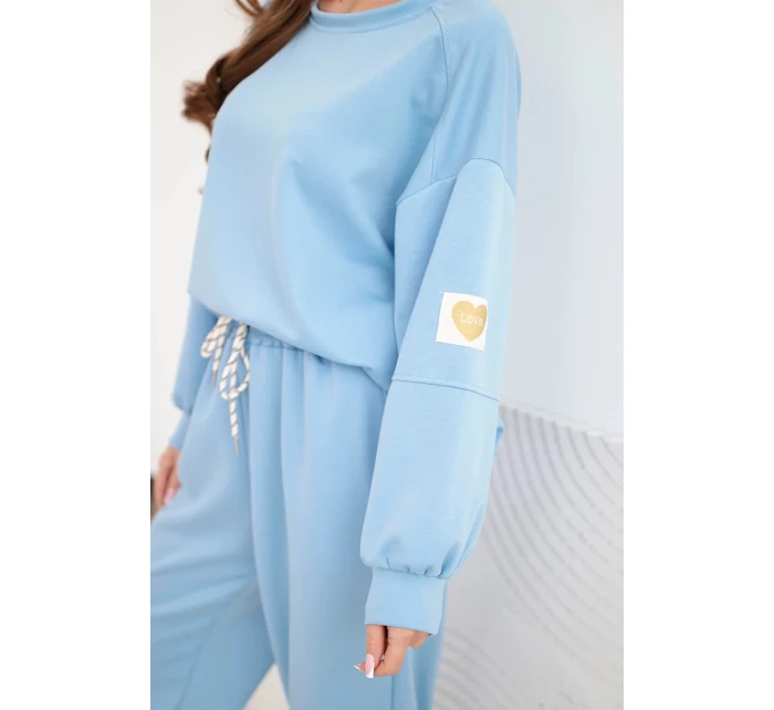 Dámský komplet máslový s volnou mikinou a kalhotami s nápisem LOVE modrý