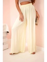 Široké dámské kalhoty s elastickým pasem žlutý