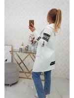 Volný svetr s nápisy model 20243113 - Kesi Volný svetr s nápisy model 20243113 - Kesi