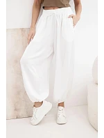 Dámské široké kalhoty s gumou v pase a vázáním v model 22064355 stylu ecru - K-Fashion