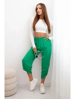 Kalhoty se širokými nohavicemi a kapsami zelený Kalhoty se širokými nohavicemi a kapsami zelený