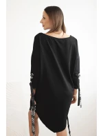 Dámská asymetrická šaty s ozdobnými model 21413453 a rukávem 3/4 modrá - K-Fashion