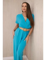 Kombinéza s ozdobným páskem v pase tyrkys Kombinéza s ozdobným páskem v pase tyrkys